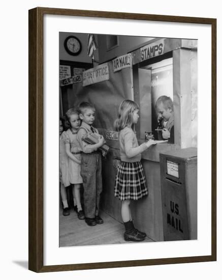 Model Post Office a Teacher Set Up in the Classroom for the Children to Learn About the Mail System-Nina Leen-Framed Photographic Print