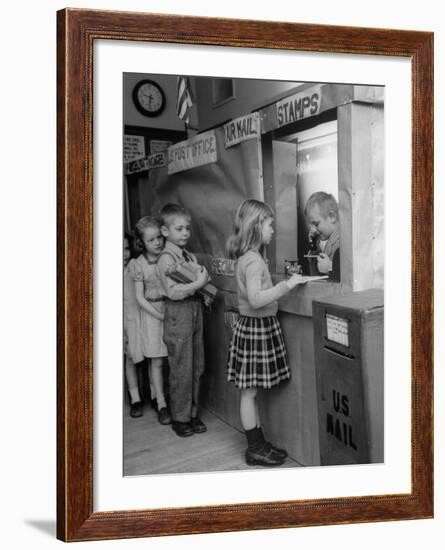 Model Post Office a Teacher Set Up in the Classroom for the Children to Learn About the Mail System-Nina Leen-Framed Photographic Print