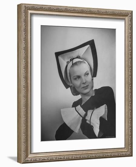 Model Selene Mahri Wearing Hattie Carnegie Fluted "Abbess" Hat with Matching Cuffed Gloves-Nina Leen-Framed Photographic Print