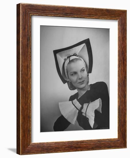 Model Selene Mahri Wearing Hattie Carnegie Fluted "Abbess" Hat with Matching Cuffed Gloves-Nina Leen-Framed Photographic Print