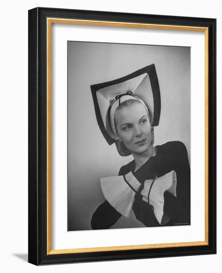 Model Selene Mahri Wearing Hattie Carnegie Fluted "Abbess" Hat with Matching Cuffed Gloves-Nina Leen-Framed Photographic Print