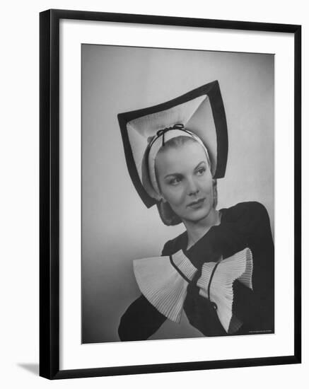 Model Selene Mahri Wearing Hattie Carnegie Fluted "Abbess" Hat with Matching Cuffed Gloves-Nina Leen-Framed Photographic Print