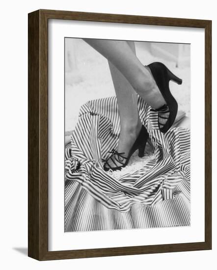 Model Showing Off Satin Pumps for the Spring Season, at Saks Fifth Avenue-Nina Leen-Framed Photographic Print