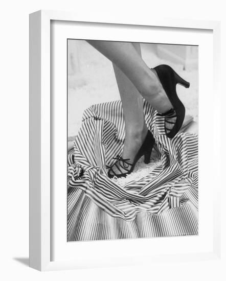 Model Showing Off Satin Pumps for the Spring Season, at Saks Fifth Avenue-Nina Leen-Framed Photographic Print