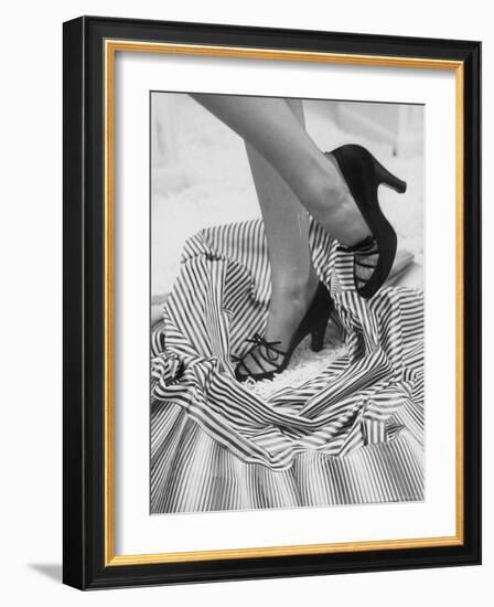 Model Showing Off Satin Pumps for the Spring Season, at Saks Fifth Avenue-Nina Leen-Framed Photographic Print