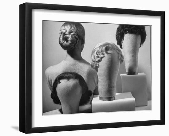 Model Vikki Dougan Wearing Attachable Bun of Extra Hair, Next to Other Wigs-Nina Leen-Framed Photographic Print