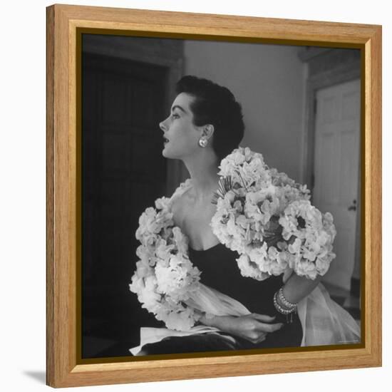 Model Wearing a Flowery Dress While Peering Into the Distance-Nina Leen-Framed Premier Image Canvas