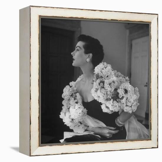 Model Wearing a Flowery Dress While Peering Into the Distance-Nina Leen-Framed Premier Image Canvas