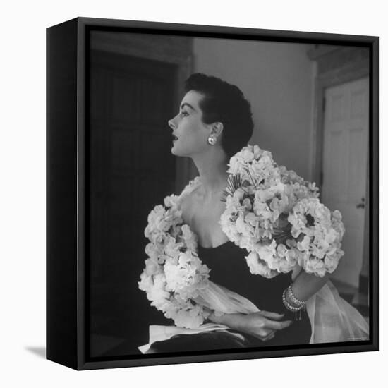 Model Wearing a Flowery Dress While Peering Into the Distance-Nina Leen-Framed Premier Image Canvas