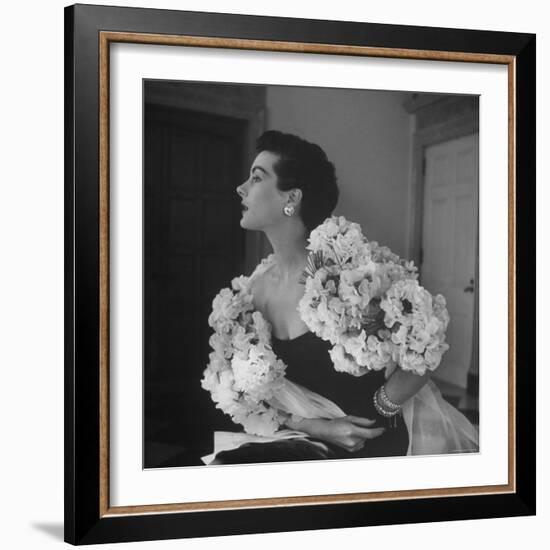 Model Wearing a Flowery Dress While Peering Into the Distance-Nina Leen-Framed Photographic Print