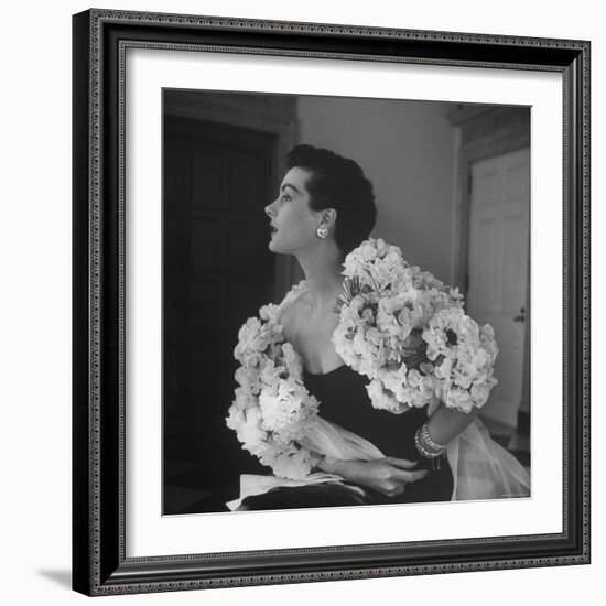 Model Wearing a Flowery Dress While Peering Into the Distance-Nina Leen-Framed Photographic Print