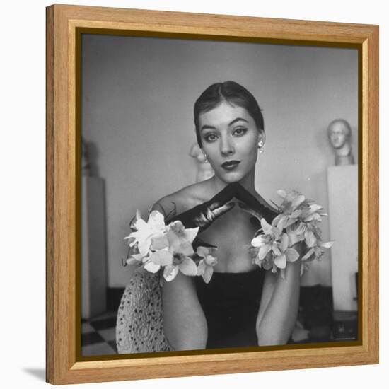 Model Wearing a Flowery Glove While Peering Into the Distance-Nina Leen-Framed Premier Image Canvas