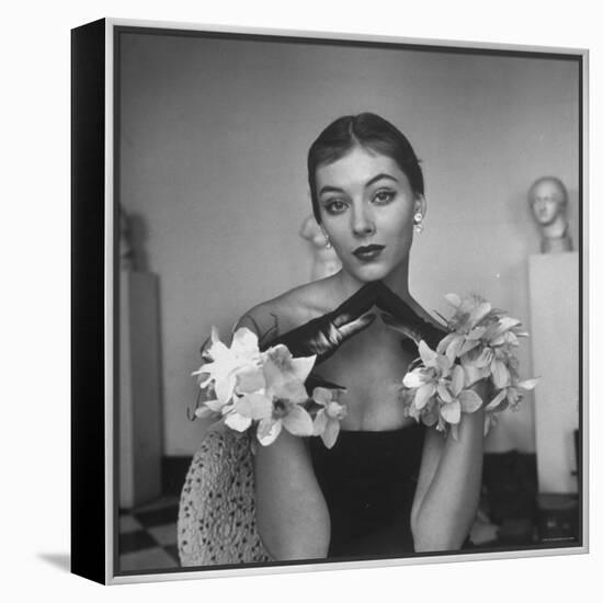 Model Wearing a Flowery Glove While Peering Into the Distance-Nina Leen-Framed Premier Image Canvas