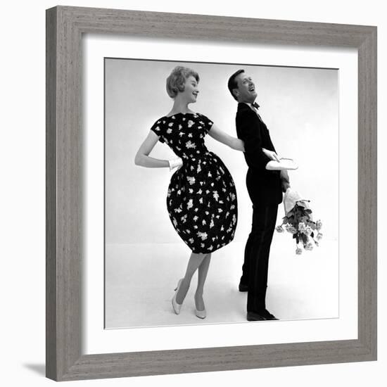 Model Wearing a Puff Ball Skirt and Escort with Roses, 1958-John French-Framed Giclee Print