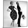 Model Wearing a Puff Ball Skirt and Escort with Roses, 1958-John French-Mounted Giclee Print