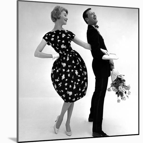 Model Wearing a Puff Ball Skirt and Escort with Roses, 1958-John French-Mounted Giclee Print