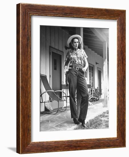 Model Wearing Rough Denim Frontier Pants and Cotton Shirt, Designed by Marge Riley-Peter Stackpole-Framed Photographic Print