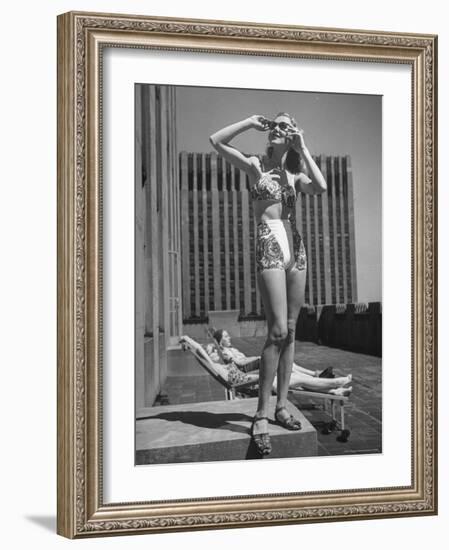 Model Wearing Sunglasses and Swim Suit Sunbathing on Roof of Rockefeller Center-Alfred Eisenstaedt-Framed Photographic Print