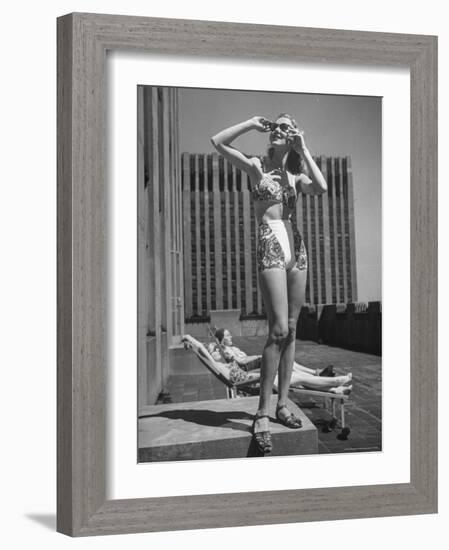 Model Wearing Sunglasses and Swim Suit Sunbathing on Roof of Rockefeller Center-Alfred Eisenstaedt-Framed Photographic Print