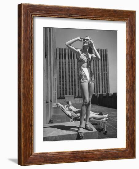 Model Wearing Sunglasses and Swim Suit Sunbathing on Roof of Rockefeller Center-Alfred Eisenstaedt-Framed Photographic Print