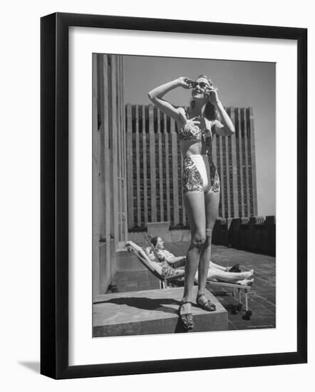 Model Wearing Sunglasses and Swim Suit Sunbathing on Roof of Rockefeller Center-Alfred Eisenstaedt-Framed Photographic Print