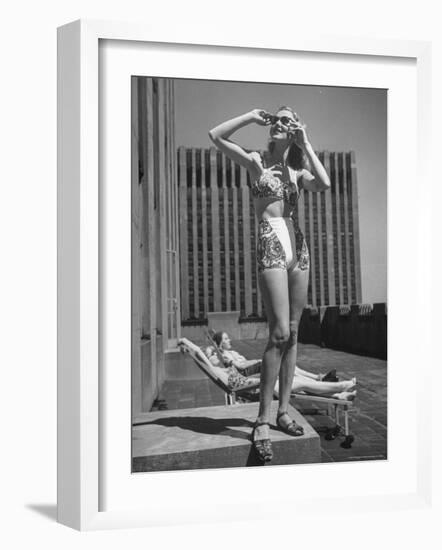 Model Wearing Sunglasses and Swim Suit Sunbathing on Roof of Rockefeller Center-Alfred Eisenstaedt-Framed Photographic Print