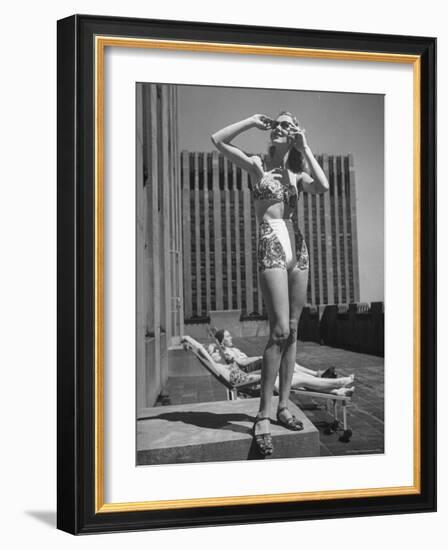 Model Wearing Sunglasses and Swim Suit Sunbathing on Roof of Rockefeller Center-Alfred Eisenstaedt-Framed Photographic Print