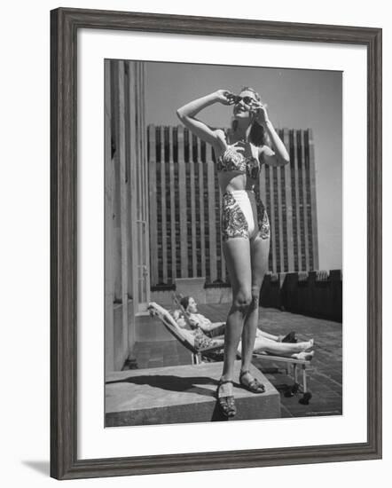 Model Wearing Sunglasses and Swim Suit Sunbathing on Roof of Rockefeller Center-Alfred Eisenstaedt-Framed Photographic Print