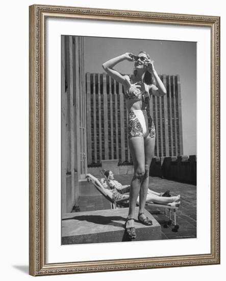 Model Wearing Sunglasses and Swim Suit Sunbathing on Roof of Rockefeller Center-Alfred Eisenstaedt-Framed Photographic Print