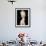 Model Wears a Creation by French Fashion Designer Jean-Paul Gaultier-null-Framed Photographic Print displayed on a wall