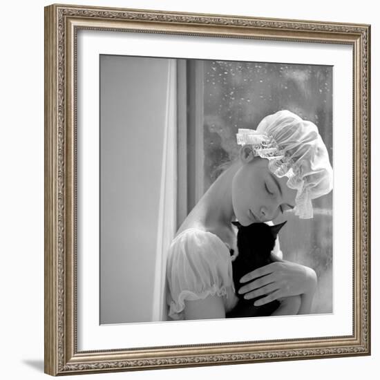 Model with Cap Embracing a Cat, 1960s-John French-Framed Giclee Print