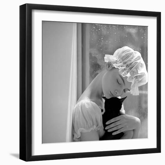 Model with Cap Embracing a Cat, 1960s-John French-Framed Giclee Print