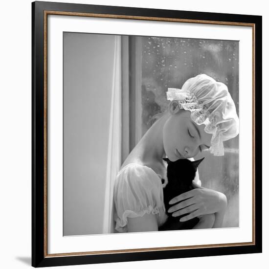 Model with Cap Embracing a Cat, 1960s-John French-Framed Giclee Print