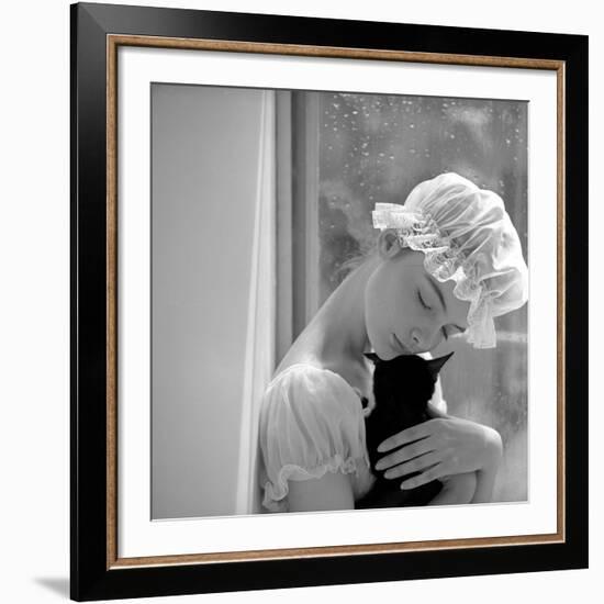Model with Cap Embracing a Cat, 1960s-John French-Framed Giclee Print