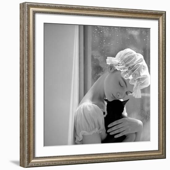 Model with Cap Embracing a Cat, 1960s-John French-Framed Giclee Print