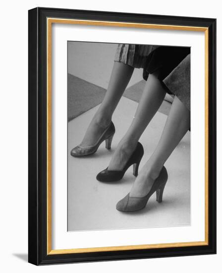 Models Displaying Different Styles of Shoes-Nina Leen-Framed Photographic Print