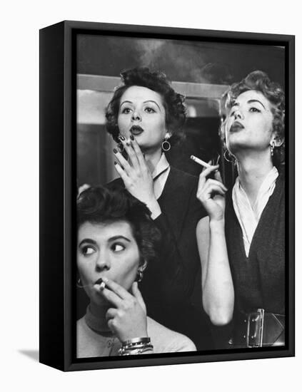 Models Exhaling Elegantly, Learning Proper Cigarette Smoking Technique in Practice For TV Ad-Peter Stackpole-Framed Premier Image Canvas
