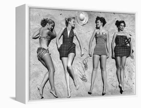 Models Lying on Beach to Display Bathing Suits-Nina Leen-Framed Premier Image Canvas