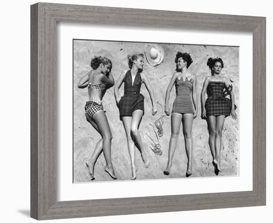 Models Lying on Beach to Display Bathing Suits-Nina Leen-Framed Photographic Print