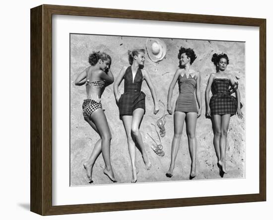 Models Lying on Beach to Display Bathing Suits-Nina Leen-Framed Photographic Print