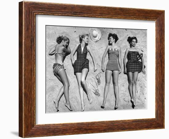 Models Lying on Beach to Display Bathing Suits-Nina Leen-Framed Photographic Print