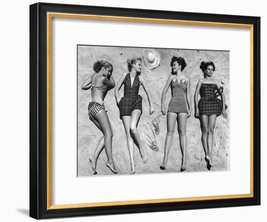 Models Lying on Beach to Display Bathing Suits-Nina Leen-Framed Photographic Print