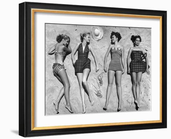 Models Lying on Beach to Display Bathing Suits-Nina Leen-Framed Photographic Print