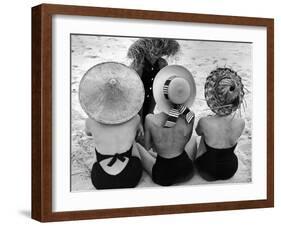 Models on Beach Wearing Different Designs of Straw Hats-Nina Leen-Framed Photographic Print