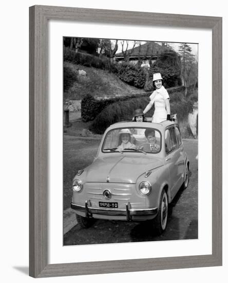 Models on Board Fiat 600-null-Framed Photographic Print