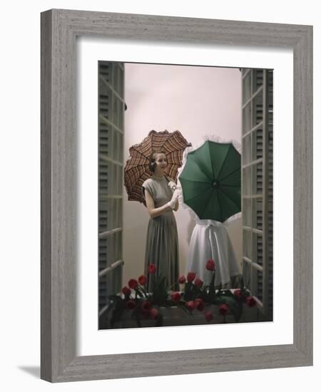 Models Posing with Umbrellas in a Macy's Department Store Display, New York, NY, 1948-Nina Leen-Framed Photographic Print