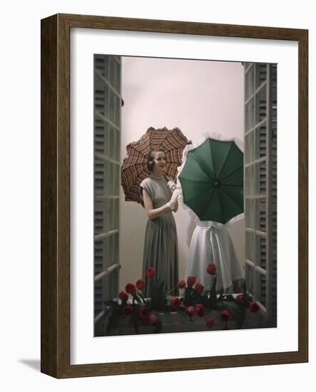 Models Posing with Umbrellas in a Macy's Department Store Display, New York, NY, 1948-Nina Leen-Framed Photographic Print