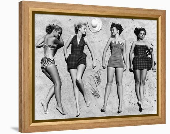 Models Sunbathing, Wearing Latest Beach Fashions-Nina Leen-Framed Premier Image Canvas