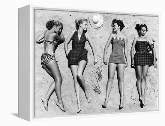 Models Sunbathing, Wearing Latest Beach Fashions-Nina Leen-Framed Premier Image Canvas