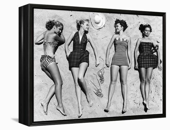 Models Sunbathing, Wearing Latest Beach Fashions-Nina Leen-Framed Premier Image Canvas